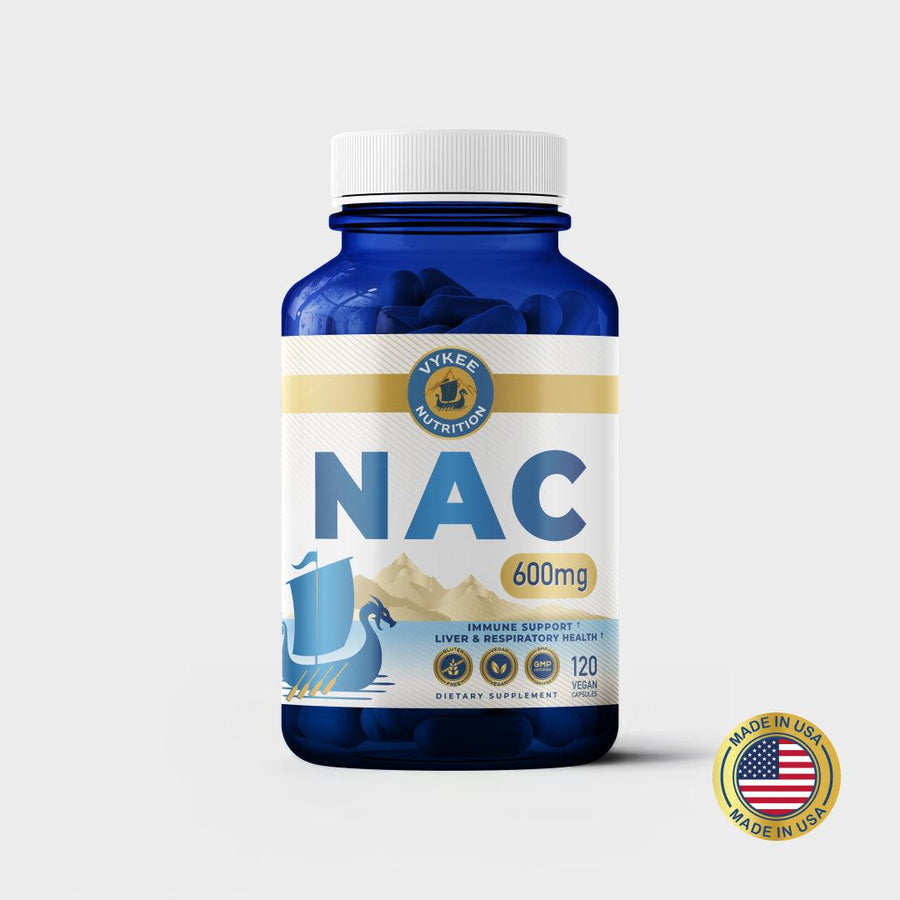 NAC Capsules bottle, navy glass with white and gold Vykee label